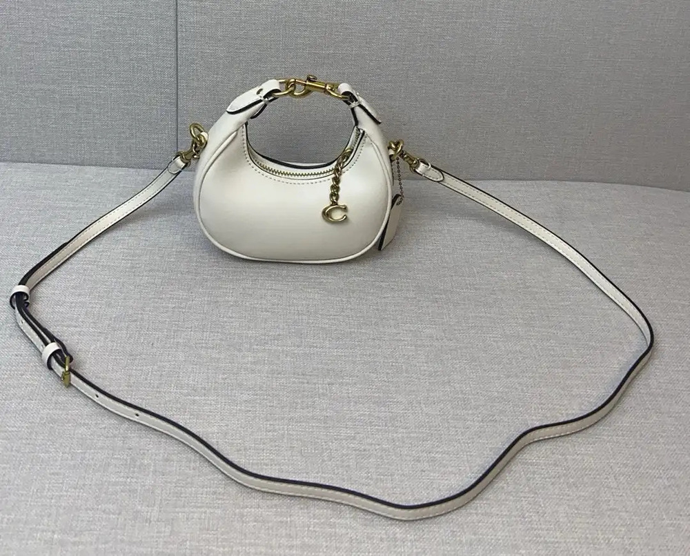 Coach white wristlet